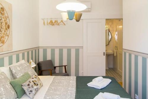 Principe Real 2 suites upscale embracing Tejo! Great WI-FI!