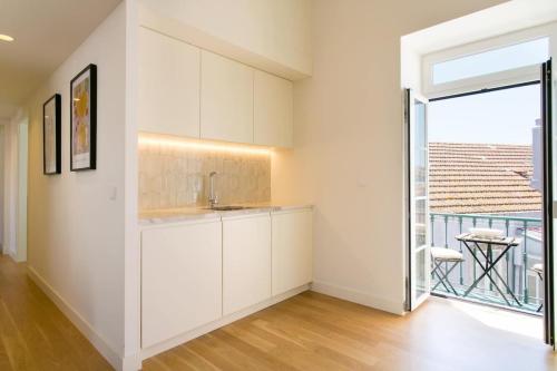 Principe Real Duplex w/balconies and RIVER views!
