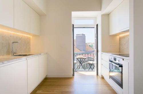 Principe Real Duplex w/balconies and RIVER views!