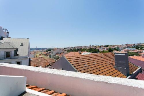 Principe Real Duplex w/balconies and RIVER views!