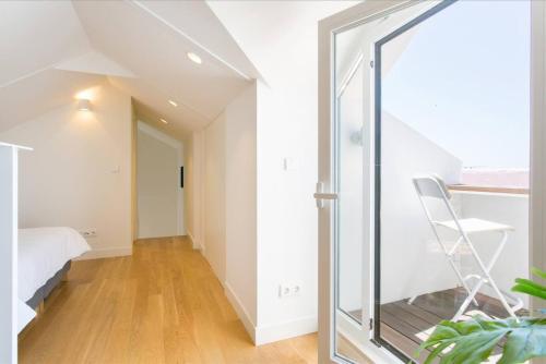 Principe Real Duplex w/balconies and RIVER views!